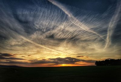 Scenic view of silhouette landscape against sky during sunset