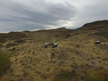 Car on mountain against sky