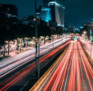 Light trails on city street at night