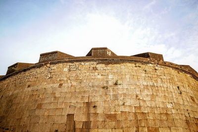Low angle view of historical building against sky