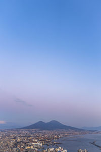 Scenic view of sea against clear sky during sunset