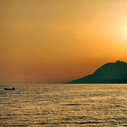 Scenic view of sea at sunset