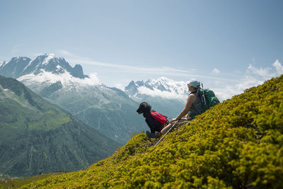 Man on mountain against sky