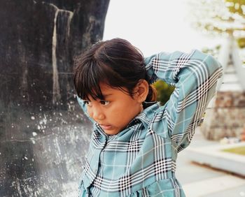 Cute girl looking away outdoors