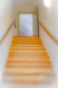 Low angle view of spiral stairs at home