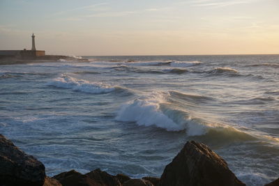 Scenic view of sea against sky during sunset