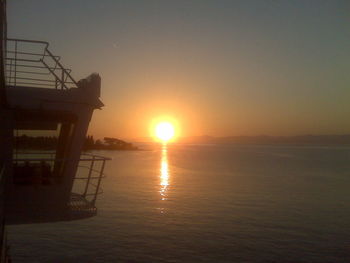 Scenic view of calm sea at sunset