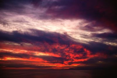 Low angle view of dramatic sky during sunset