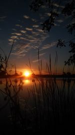 Scenic view of sunset over river