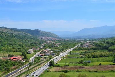 High angle view of road amidst landscape against sky