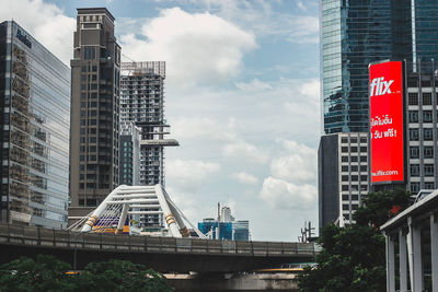 Low angle view of buildings against sky in city