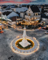 High angle view of illuminated buildings in city