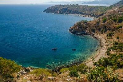 High angle view of sea and rocks