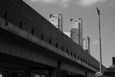 Low angle view of skyscrapers against sky