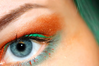 Extreme close-up portrait of woman eye wearing make-up