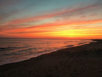 Scenic view of sea at sunset