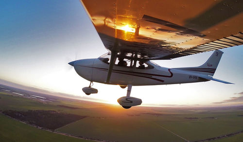 Airplane flying against clear sky