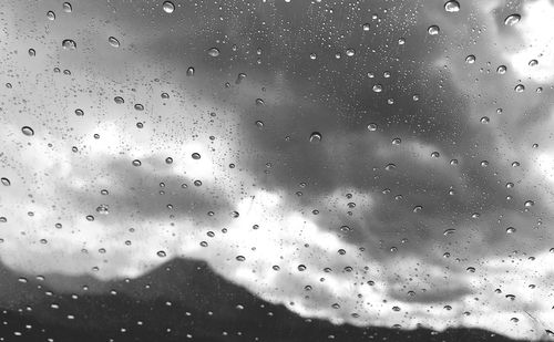 Close-up of water drops on glass