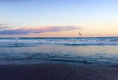 Scenic view of sea at sunset