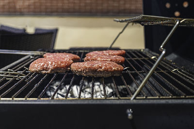 Hamburgers on the barbecue. close-up view.