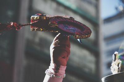 Close-up of woman holding umbrella