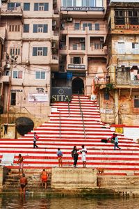 Low angle view of people on building