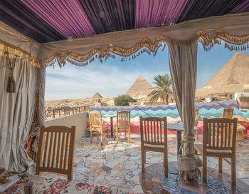 Chairs and tables at beach