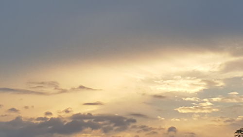 Low angle view of clouds in sky during sunset