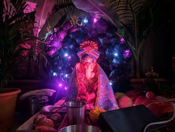 Illuminated statue at night