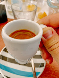 Close-up of person holding tea cup