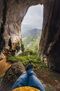 Low section of man on rock