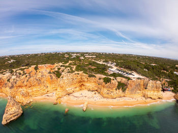 Scenic view of rock formations against sky