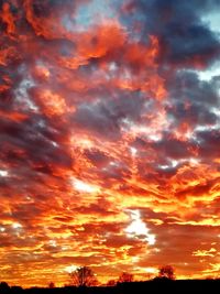 Low angle view of dramatic sky during sunset