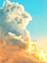 Low angle view of clouds in sky during sunset