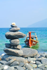 Stack pebbles on the beach at koh hin ngam in tarutao national marine park ,thailand.