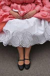 Low section of woman standing on floor