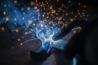 High angle view of sparks on table