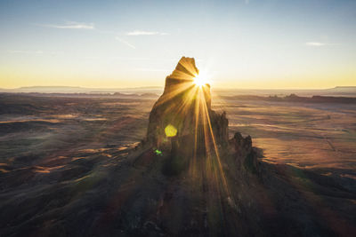 Aerial view of agathla peak in the morning from above, arizona