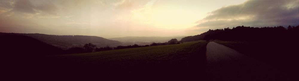 Panoramic view of landscape against sky during sunset