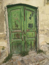 Close-up of closed door of old house