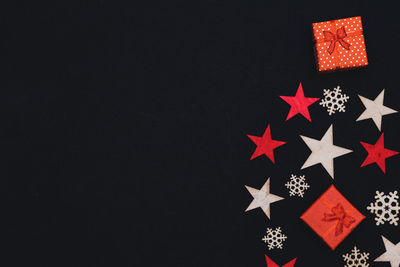 Close-up of christmas decoration against black background