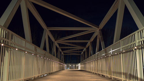 Empty footbridge at night