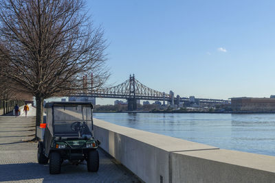 Bridge over river against clear sky