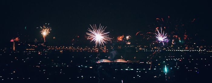Firework display at night