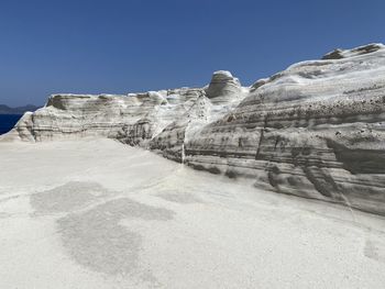 Rock formations against blue sky