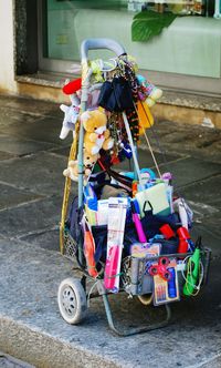 Close-up of toys for sale at street