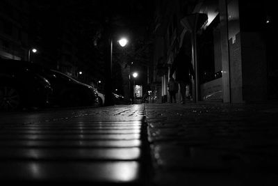 Surface level of illuminated street light at night