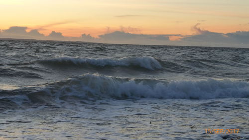 Scenic view of sea against sky during sunset