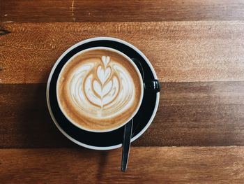 High angle view of cappuccino on table