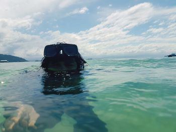 Woman swimming in sea